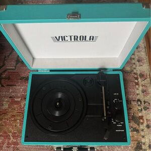 Victrola turquoise suitcase record player